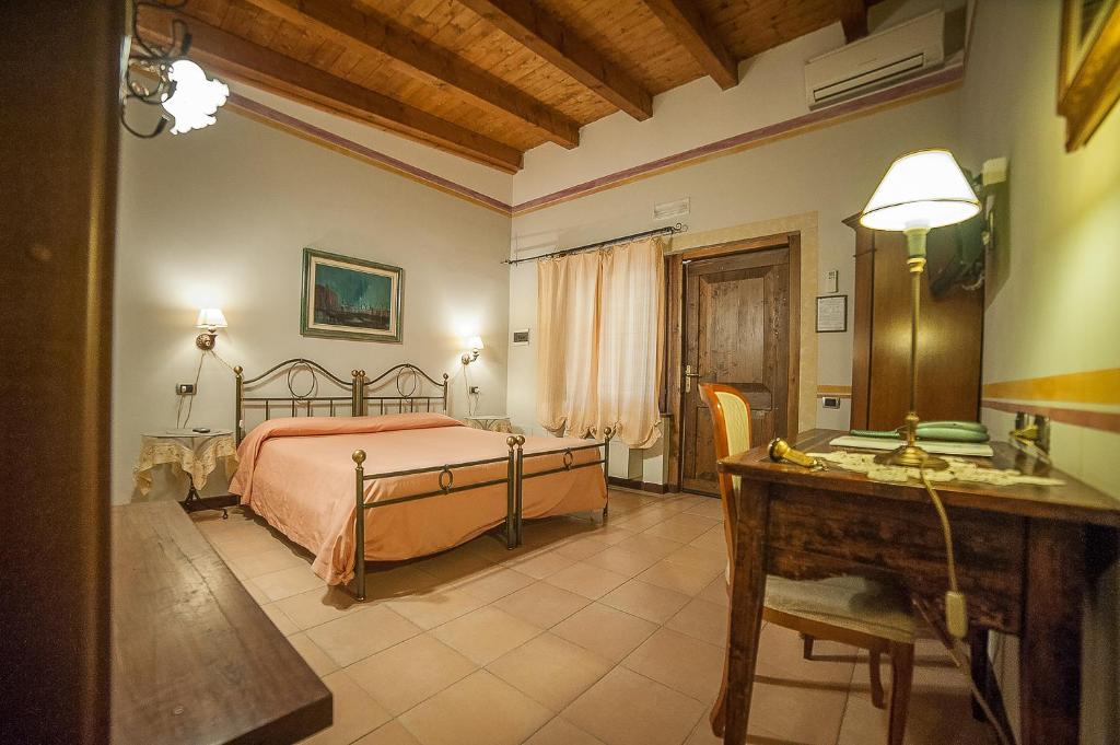 Postel nebo postele na pokoji v ubytování Park Hotel Elefante