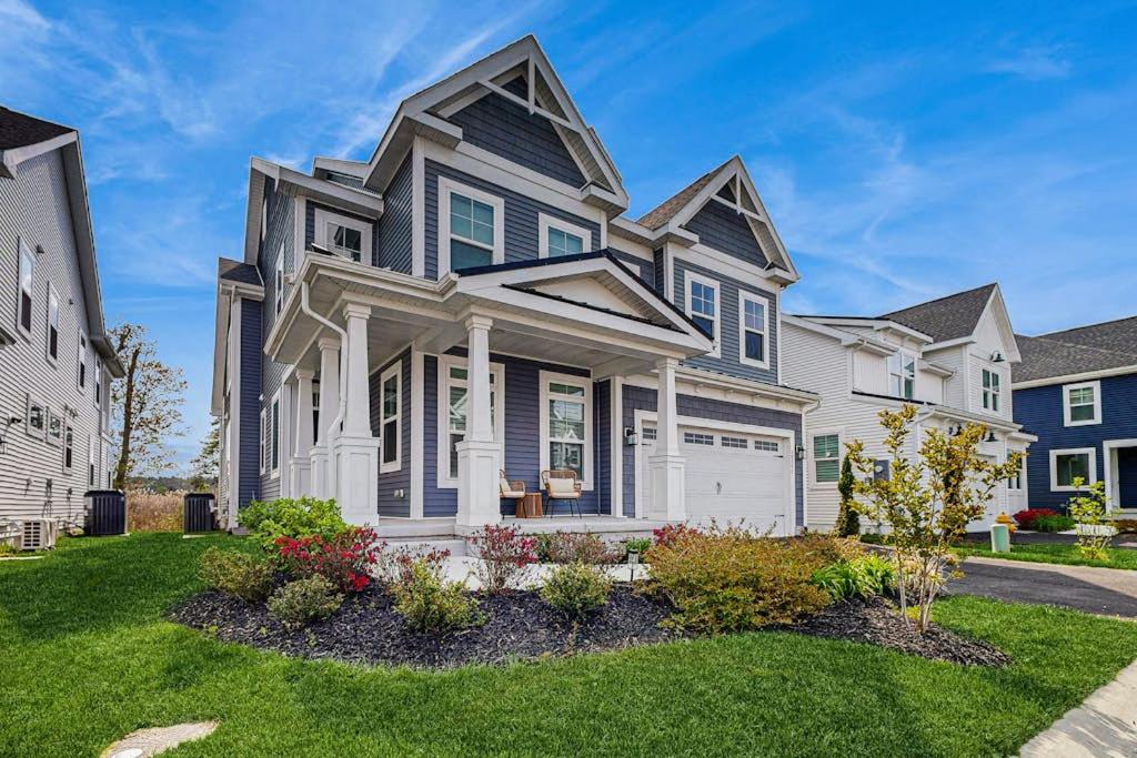 a house with blue and white at Marlin Chase --- 30347 Bermuda Dr in Ocean View