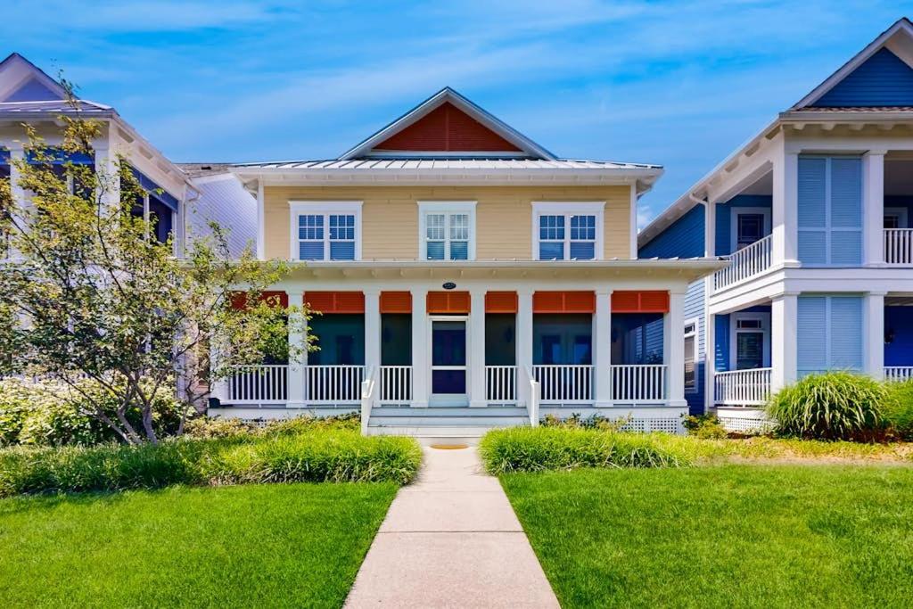 a large house with a pathway in front of it at The Peninsula --- 33129 Serenity Circle #87 in Millsboro