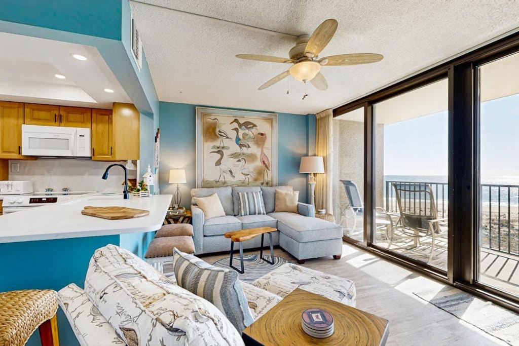 a kitchen and living room with a couch and a table at Sea Colony --- 508 Dover House Rd in Bethany Beach