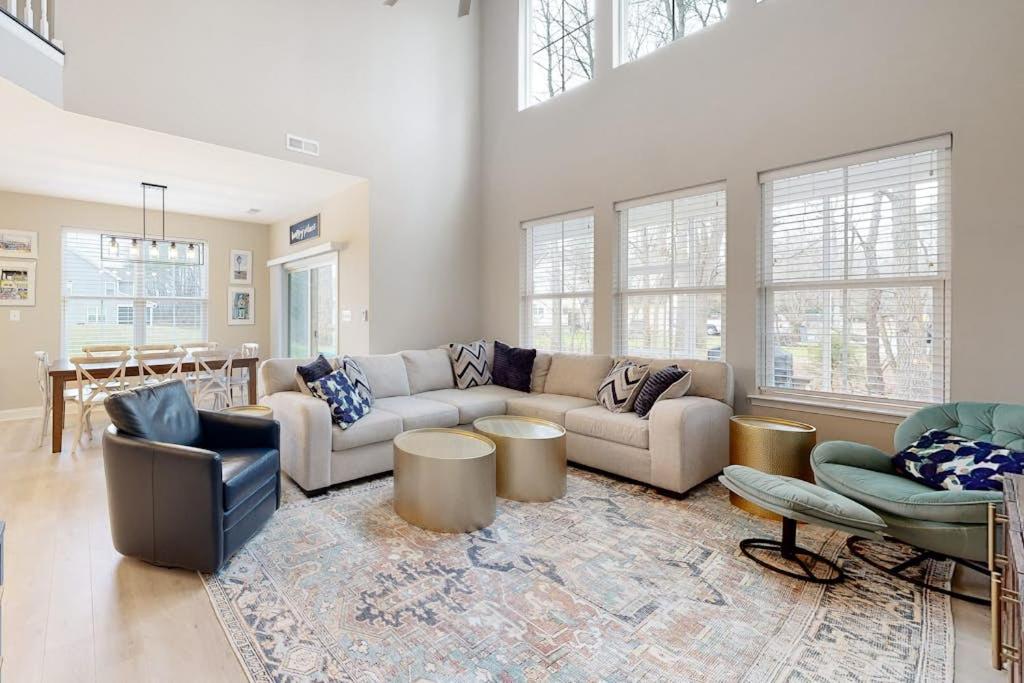 a large living room with a couch and chairs at Bishops Landing --- 38480 Carroll Dr in Millville