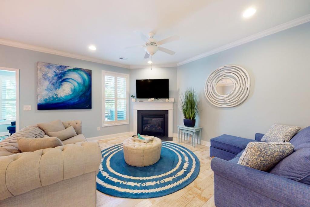 a living room with two couches and a fireplace at Bayside Resort 2639zero Seabreeze Lndg in Selbyville