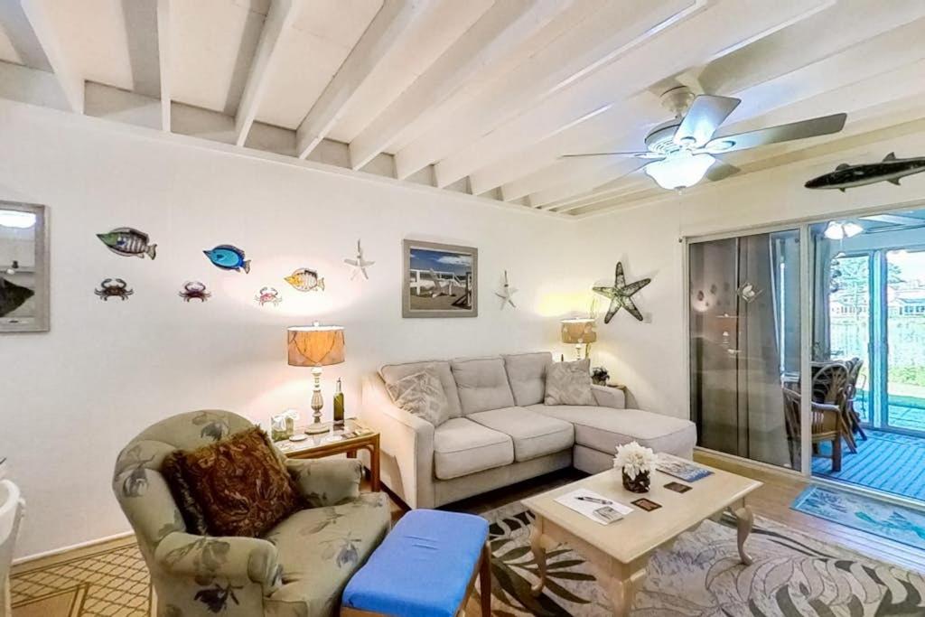 a living room with a couch and a table at Mallard Lakes --- 38082 Mockingbird Ln Unit #48 in Selbyville