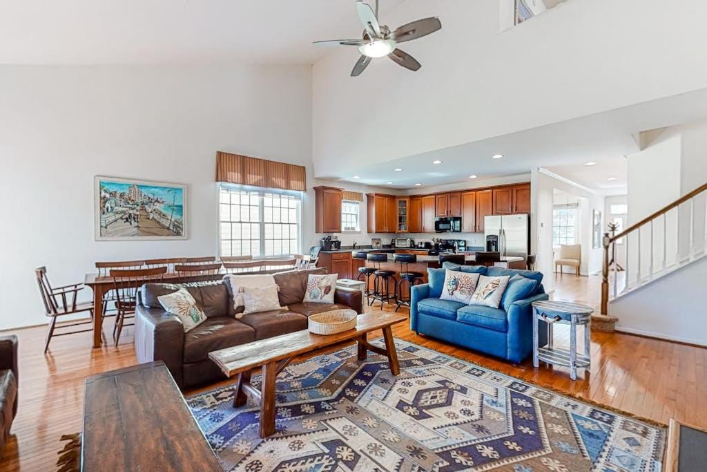 a living room with a couch and a table at Bear Trap Dunes - 15 Sycamore in Ocean View