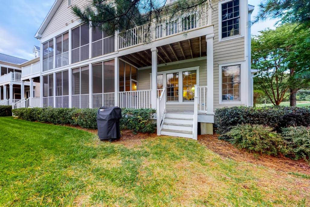 a house with a trash can in front of it at Bear Trap Dunes - 112A Willow Oak Ave in Ocean View
