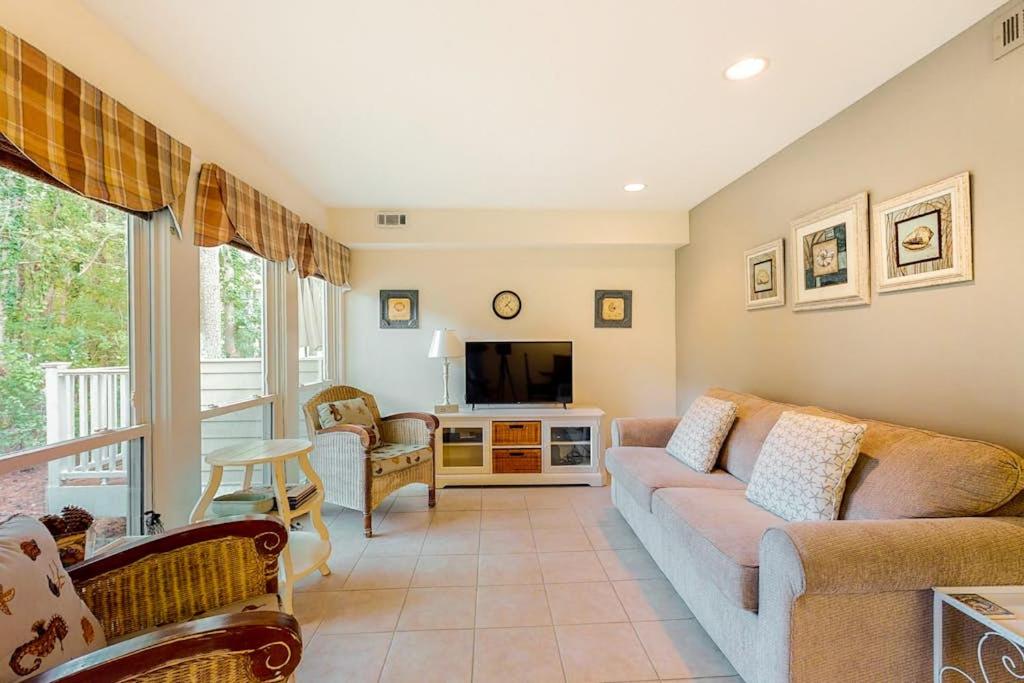 a living room with a couch and a tv at Sea Colony - 1804 Doubles in Bethany Beach