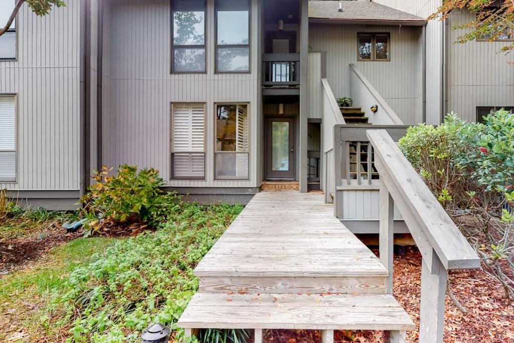 a wooden walkway leading to a house at Sea Colony - 3306 Round Robin Way in Bethany Beach