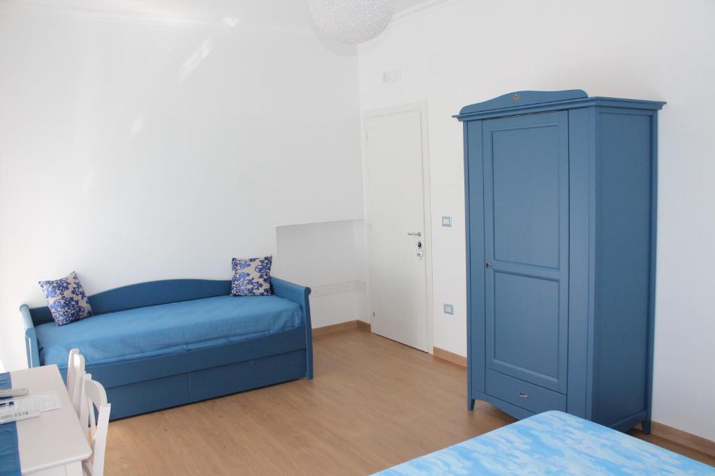 Postel nebo postele na pokoji v ubytování B&B Una Rotonda sul mare