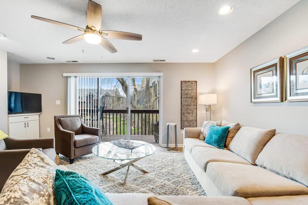 a living room with a couch and a table at Eagles Landing I --- 260 Sea Eagle Dr Unit 7 in Rehoboth Beach