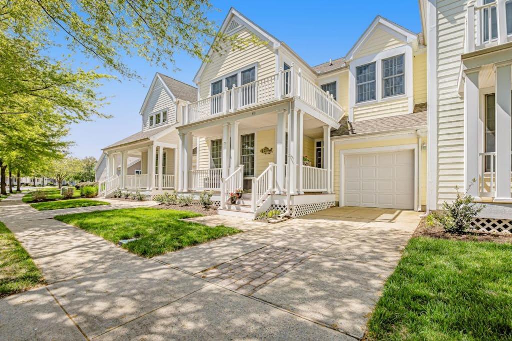 a large white house with a driveway at Bear Trap Dunes - 60 Willow Oak in Ocean View