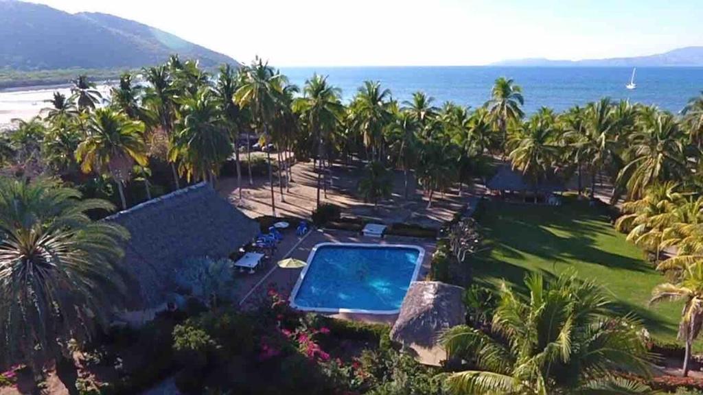 an aerial view of a resort with a swimming pool at BeachCasaDonPepe in Barra de Potosi