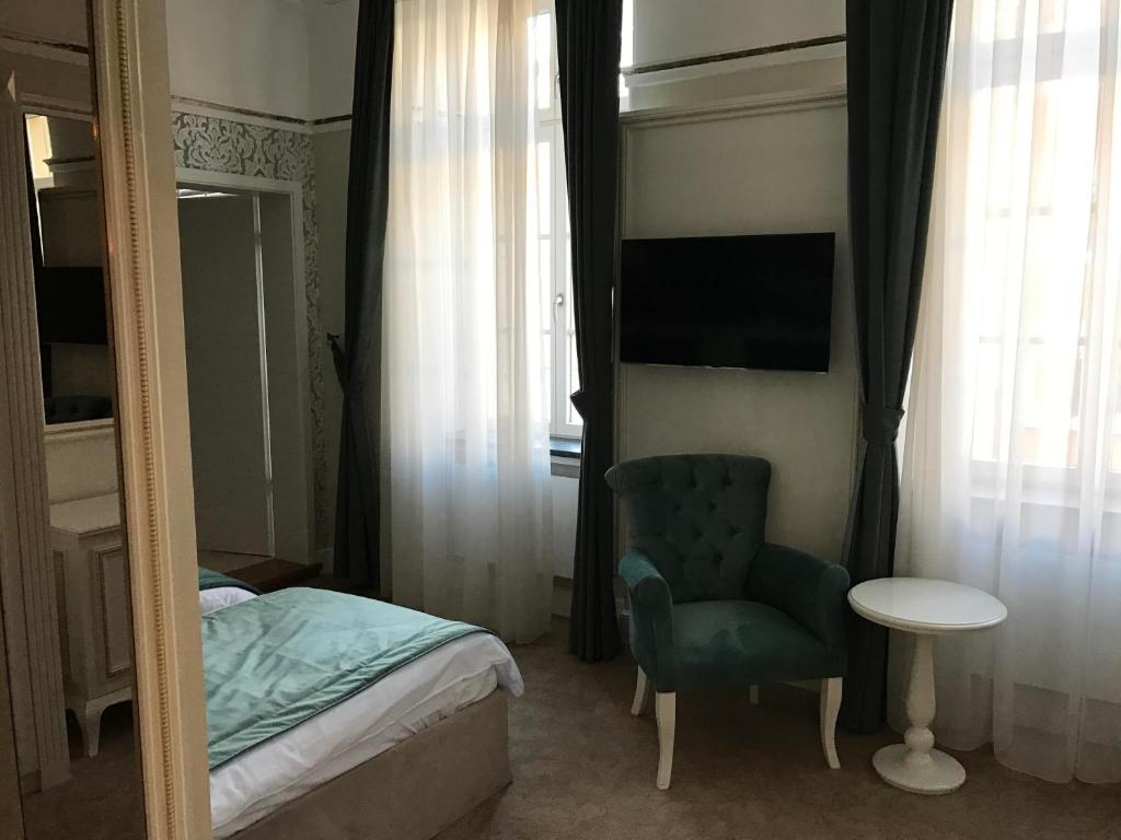 Postel nebo postele na pokoji v ubytování Hotel Amts-Apotheke