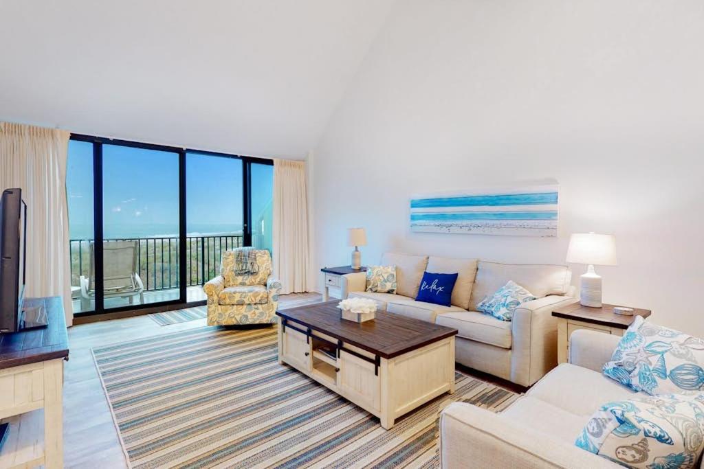 a living room with a couch and a table at Sea Colony - 2D Brandywine Garden House Rd in Bethany Beach