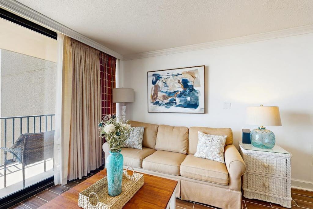 a living room with a couch and a table at Sea Colony --- 508 Brandywine house in Bethany Beach