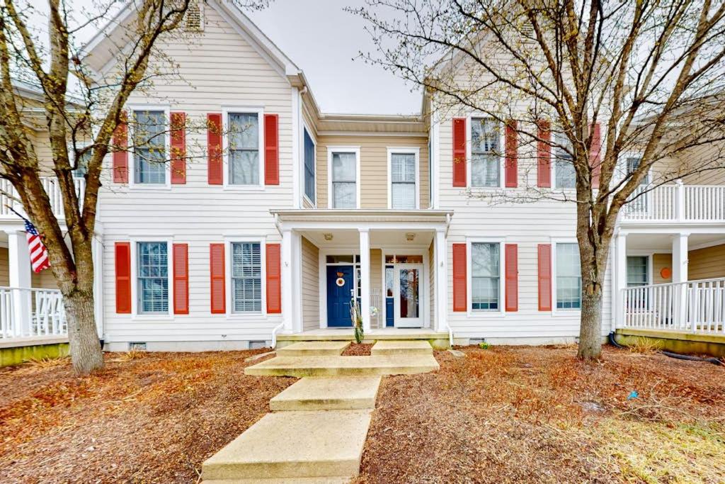 a large white house with red shutters at Bear Trap Dunes 132H October Glory Ave in Ocean View
