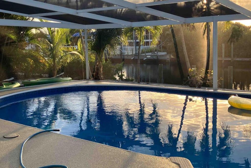 a swimming pool in a house with a swimming poolvisor at Franzone Fun in Saint James City