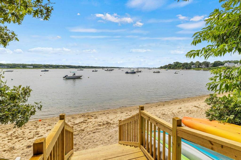 a view of a beach with boats in the water at Dolce Vita in Falmouth