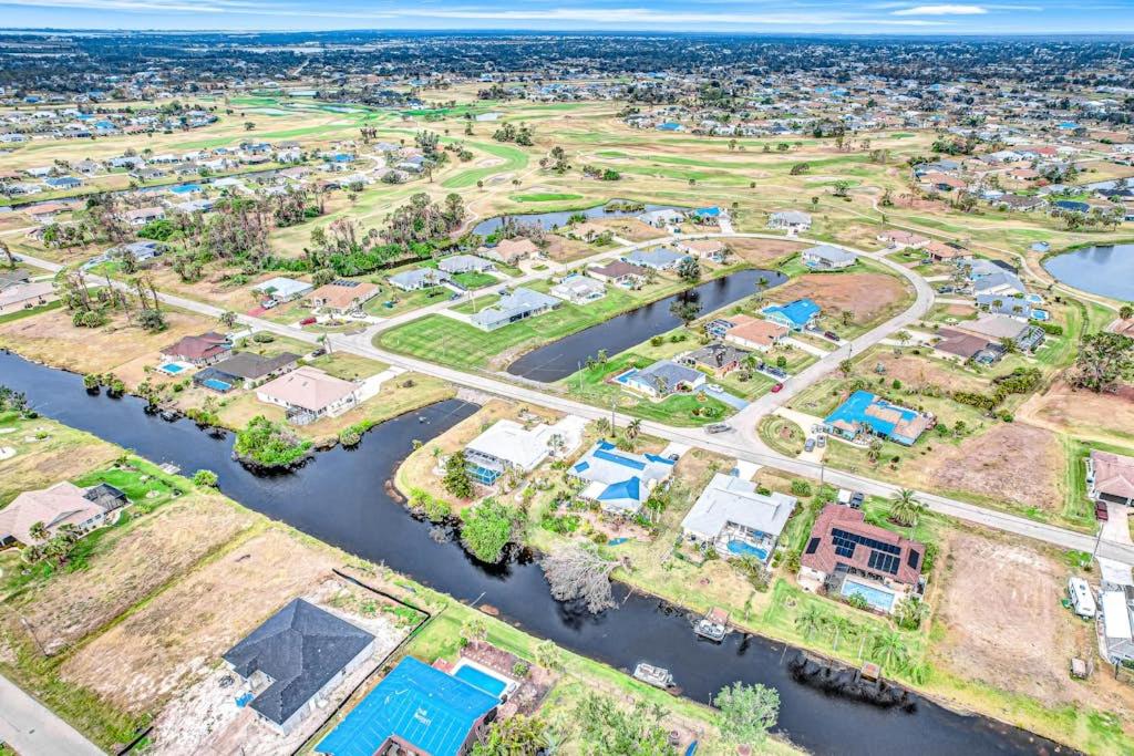 an aerial view of a subdivision next to a river at Rotonda Getaway in Rotunda-West