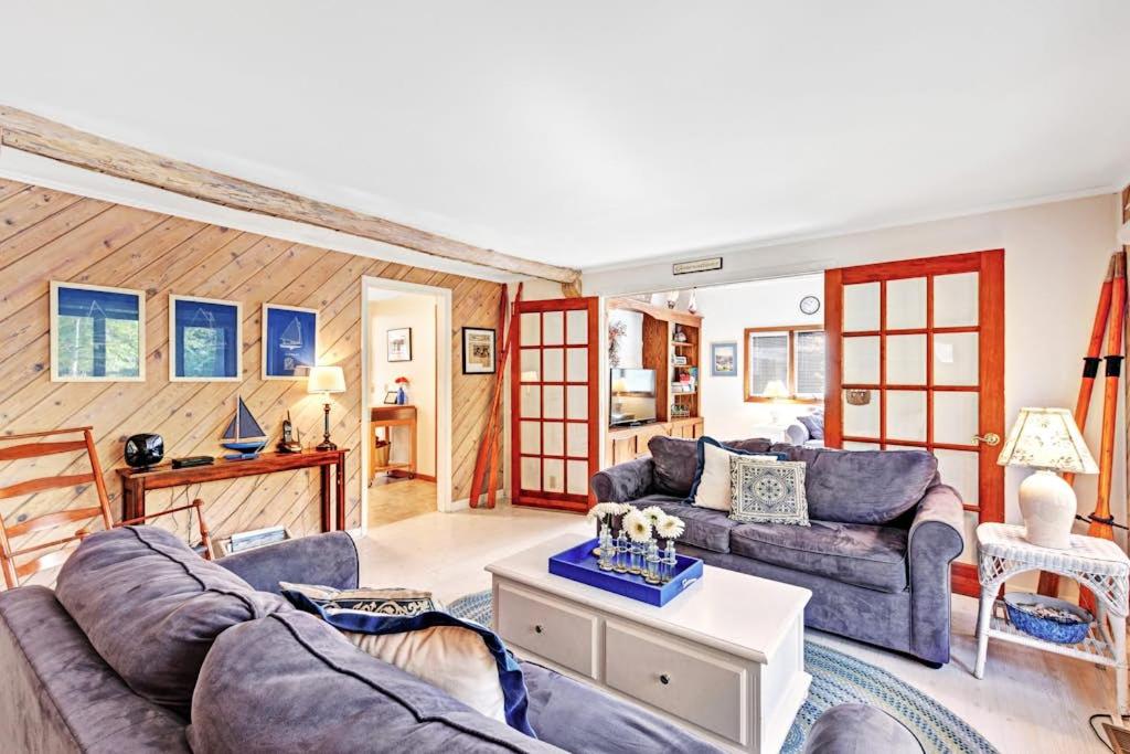 a living room with a couch and a table at Generations in Douglas
