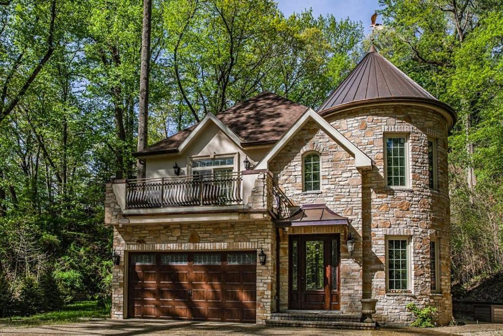 a stone house with a balcony on top of it at Eagles Nest in New Buffalo
