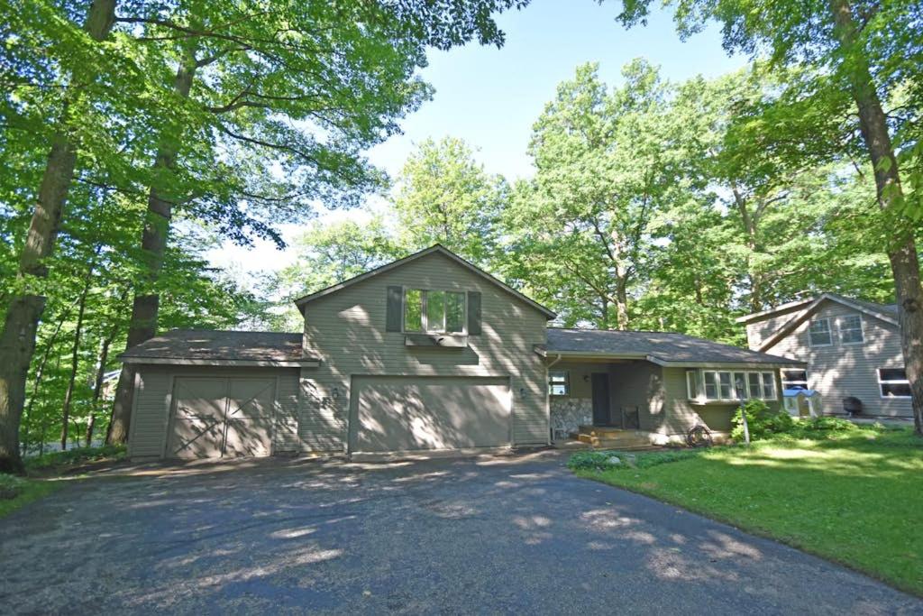 a house with a garage and a driveway at Thorogood Glen in Empire