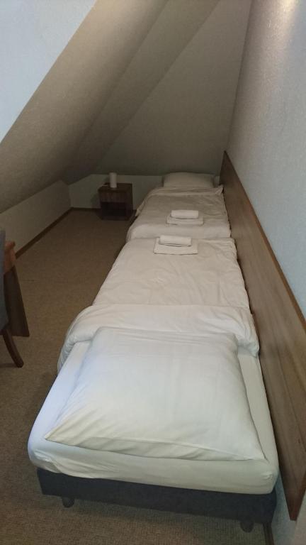 Posteľ alebo postele v izbe v ubytovaní Gościniec Lizawka