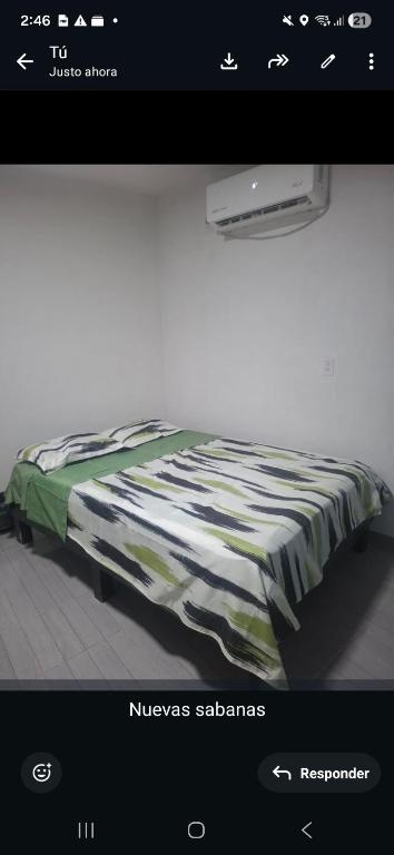 a picture of a bed in a room at Casa alexander 2 in Acapulco