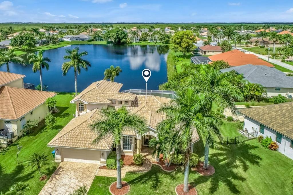 an aerial view of a house with palm trees at Sable Retreat in Cape Coral