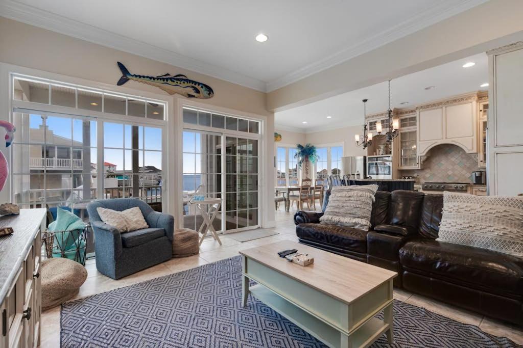 a living room with a couch and a table at Edgewater Acres --- 38874 Old Lighthouse Rd in Selbyville