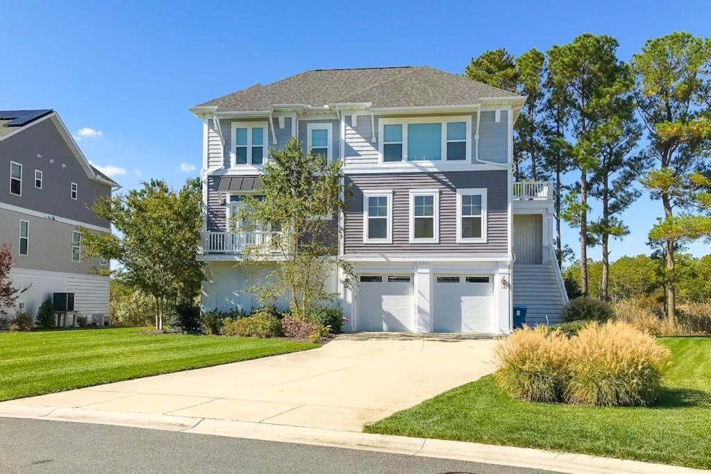 a large house with a driveway at Watermark North --- 38918 Silver Sands Dr in Bethany Beach