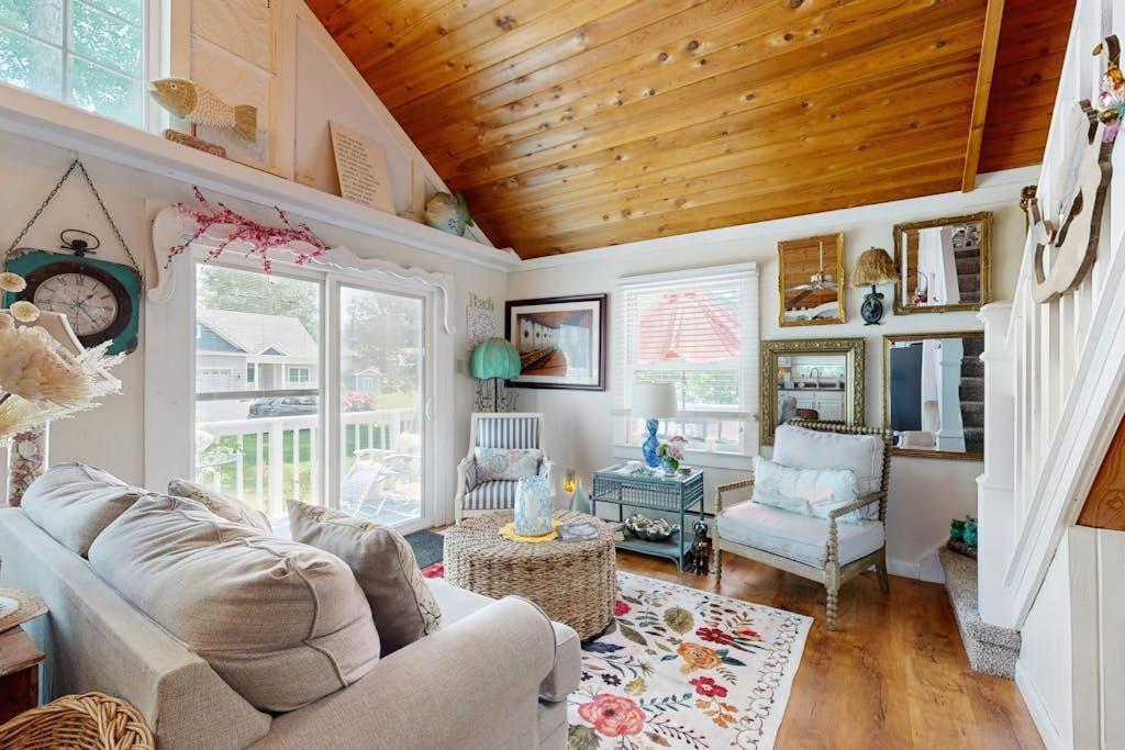 a living room with a couch and a table at Neck Village in Ocean View