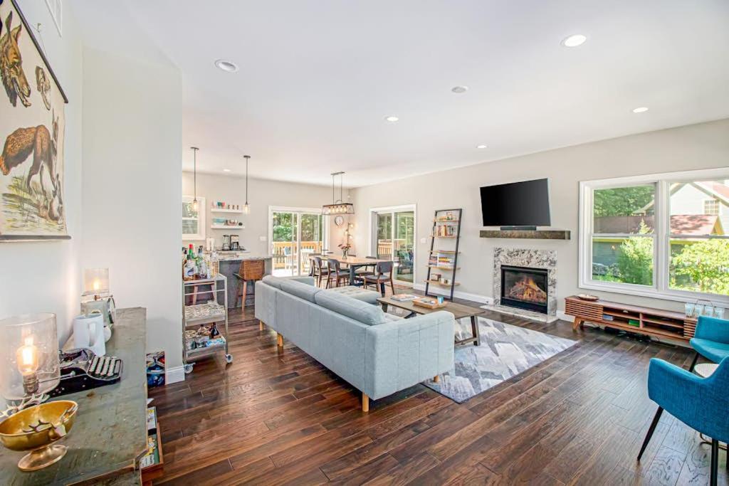 a living room with a couch and a fireplace at Friendly Farms in Lakeside
