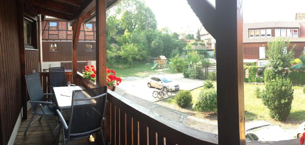 a balcony with a view of a yard at Haus zum Römer in Arnstadt