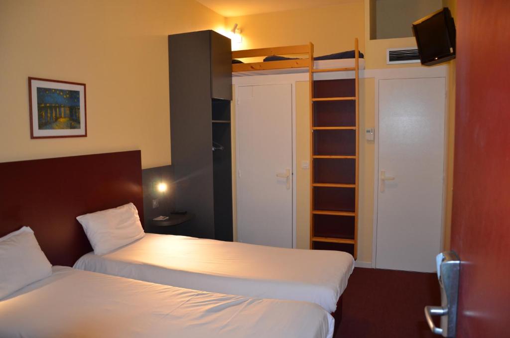 Postel nebo postele na pokoji v ubytování Mape hôtel