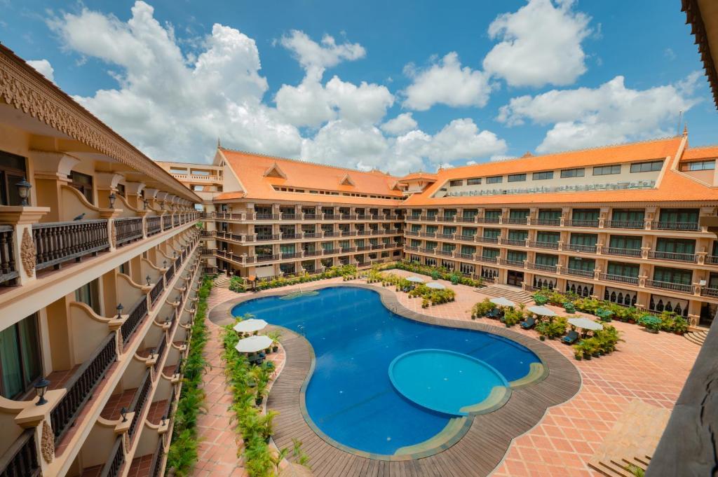 an aerial view of the courtyard of a resort with a swimming pool at Bayon Era Hotel in Siem Reap