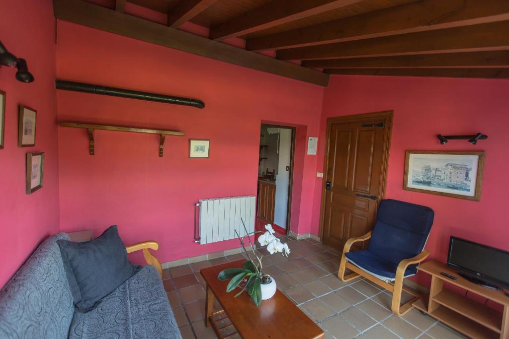 A seating area at Apartamentos Rurales Playa del Canal