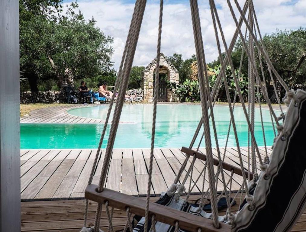 Bazén v ubytování Masseria Trulli&Stelle B&B nebo v jeho okolí