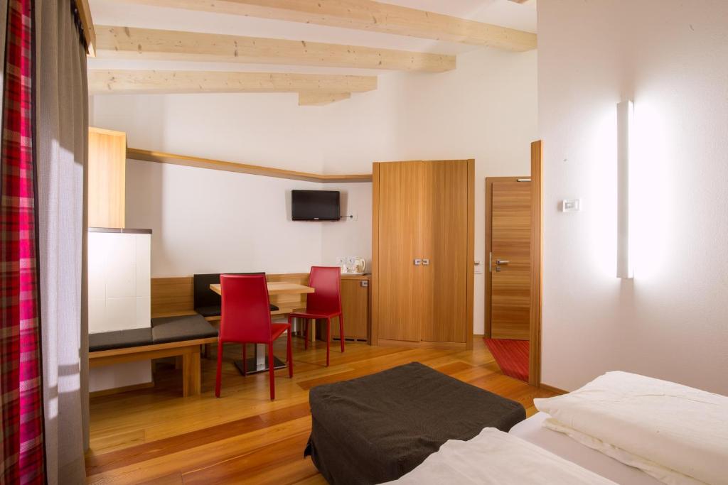 TV a/nebo společenská místnost v ubytování Hotel Al Cervo