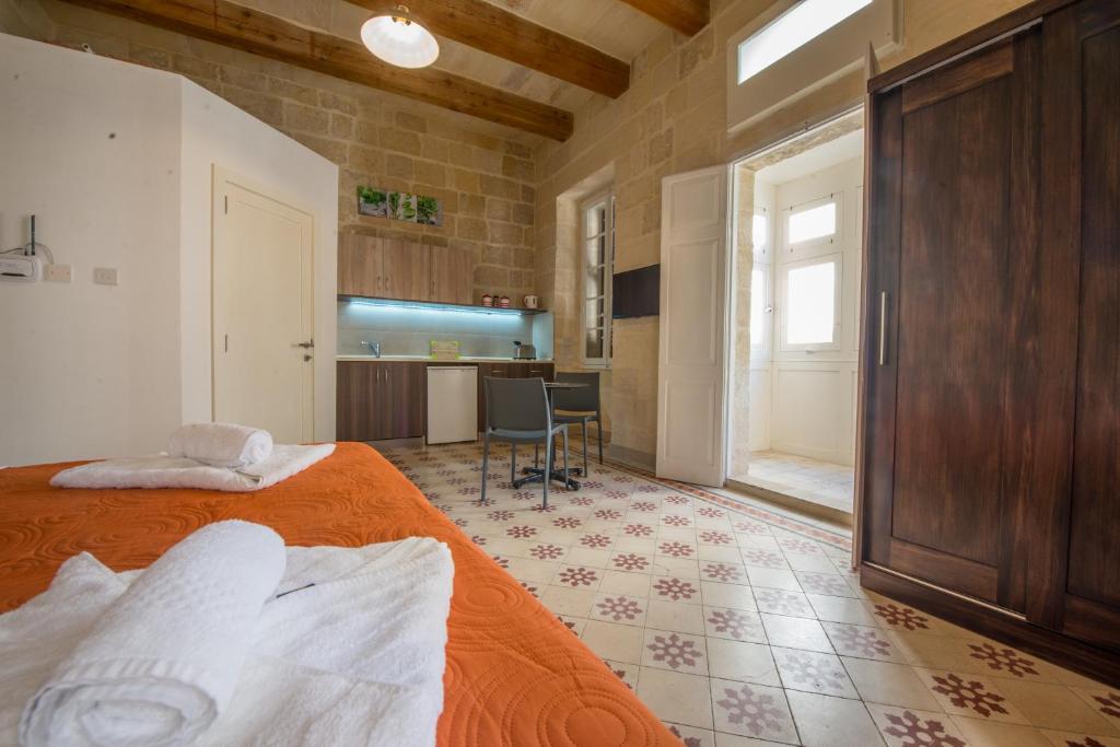 Postel nebo postele na pokoji v ubytování Casa Lapira