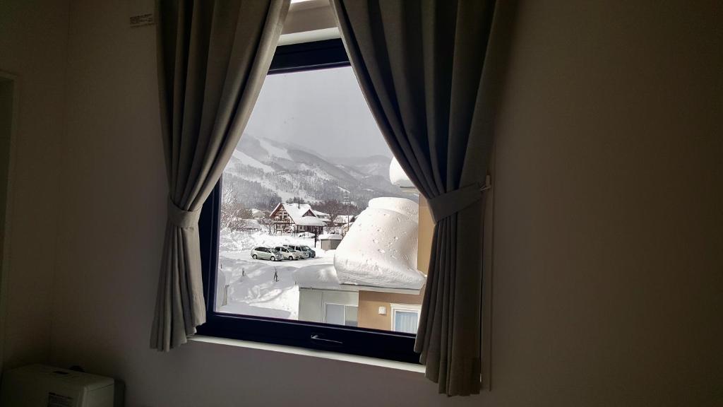 Posezení v ubytování Uchimaru Hakuba