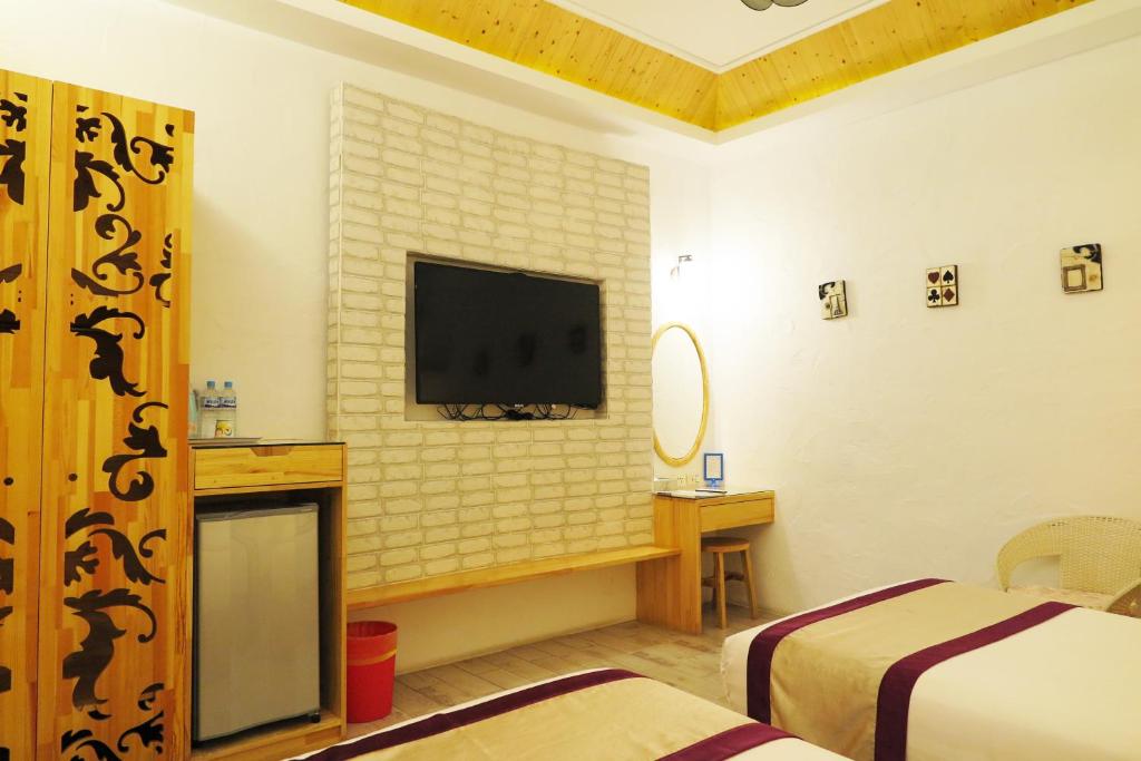 TV a/nebo společenská místnost v ubytování Kenting Sin Sin Hotel IIl