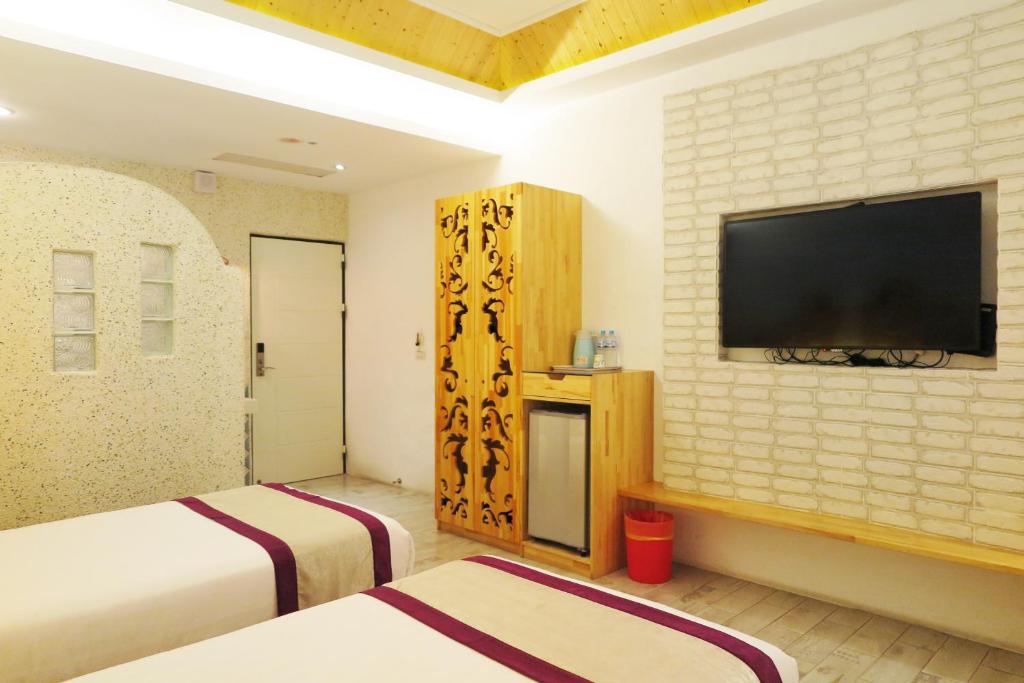 TV a/nebo společenská místnost v ubytování Kenting Sin Sin Hotel IIl