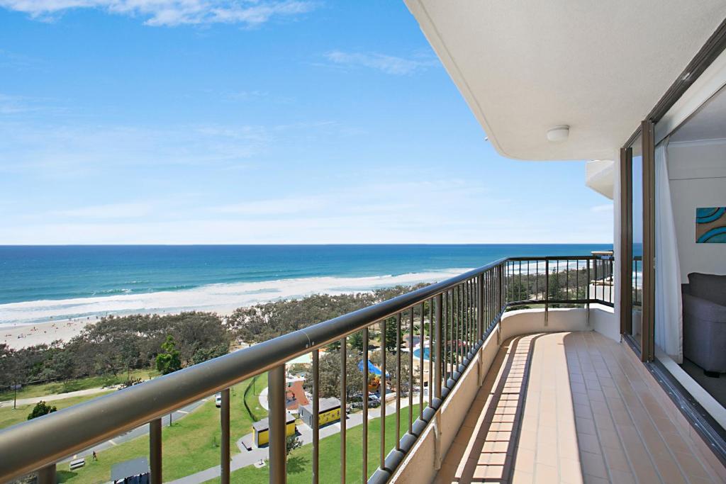 a balcony with a view of the ocean at Voyager Resort in Gold Coast