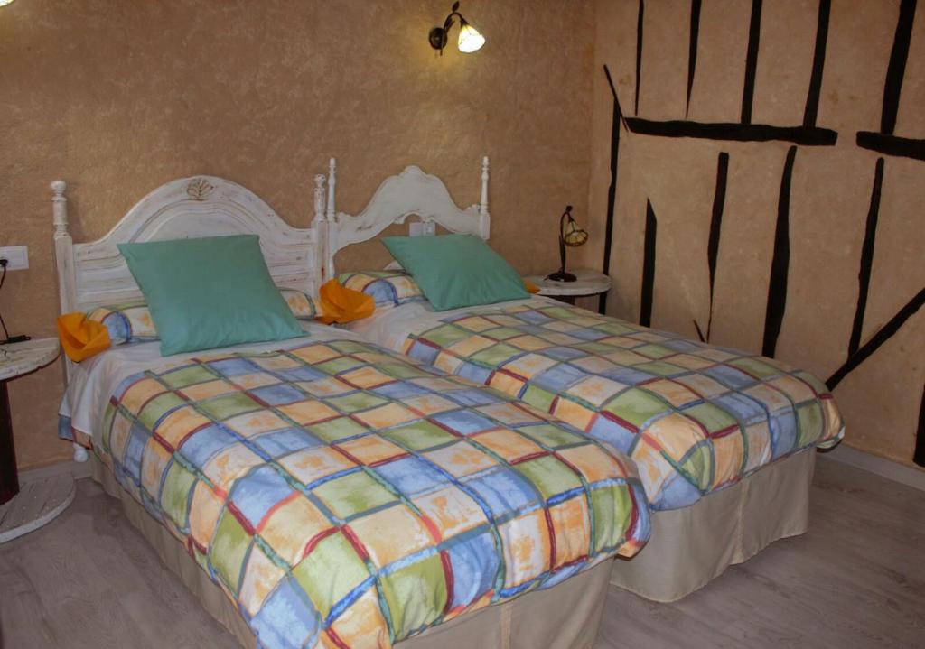 Cama o camas de una habitación en Casa Angel