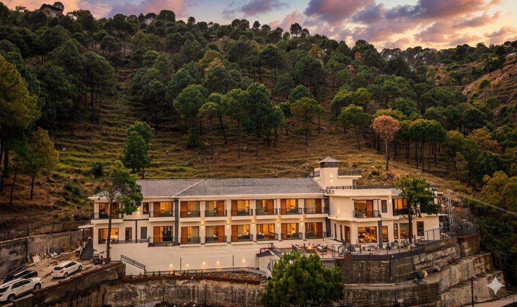 a house on the side of a mountain at Ventus Pines in Kasauli