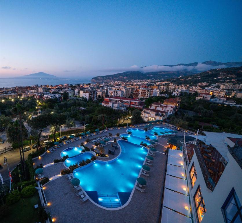 an overhead view of a swimming pool at a resort at Hilton Sorrento Palace in Sorrento