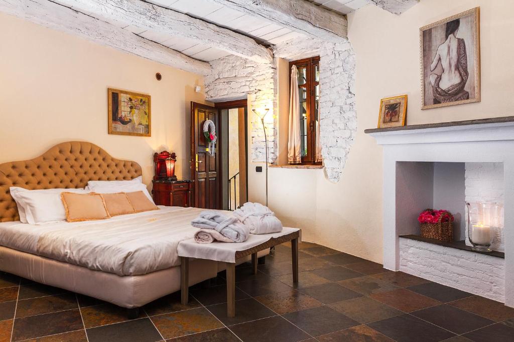 Een bed of bedden in een kamer bij Dimora I Manichei