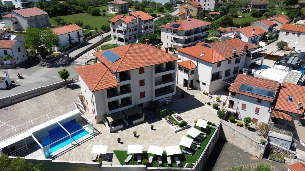 an aerial view of a house with a swimming pool at Villa Aria in Malinska