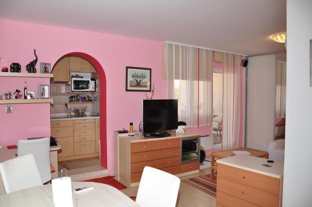 Televízia a/alebo spoločenská miestnosť v ubytovaní BM Apartments Split