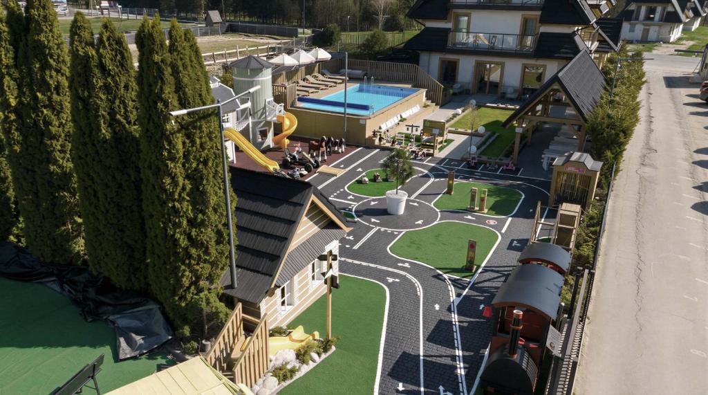 an overhead view of a water park with a playground at Babka in Białka Tatrzańska